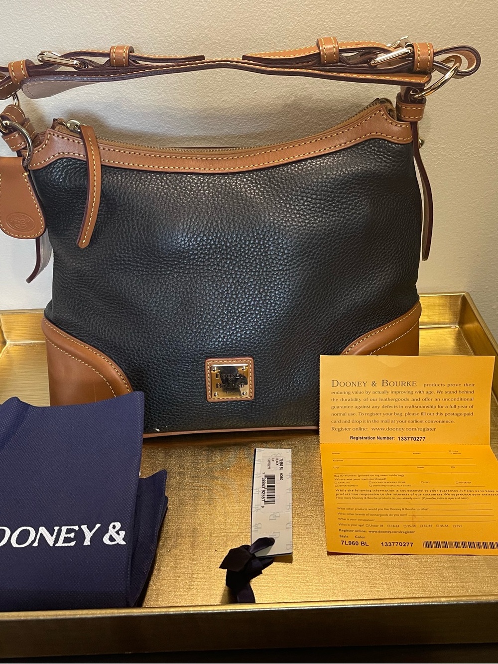 Dooney & Bourke Black Leather Hobo Bag (Black with Brown Trim)
